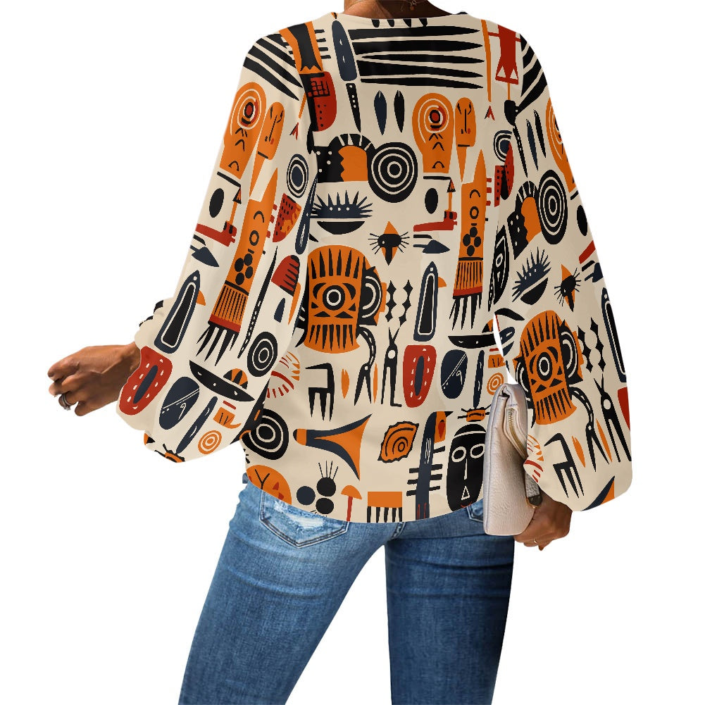 Tribal and Indigenous V-Neck Chiffon Puff Sleeve Blouse by Luxtrini