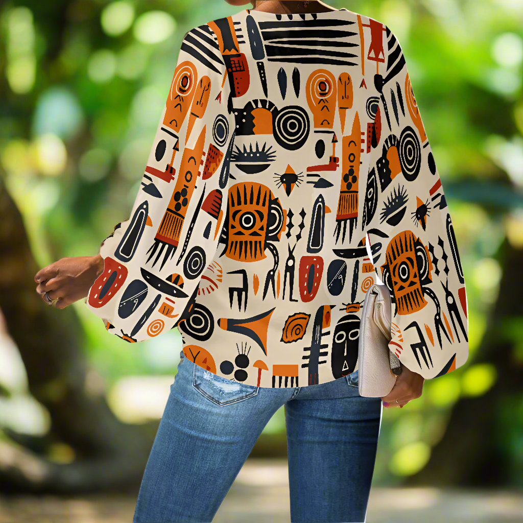 Tribal and Indigenous V-Neck Chiffon Puff Sleeve Blouse by Luxtrini