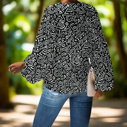 Black and White Tribal Art Pattern V-Neck Chiffon Puff Sleeve Blouse by Luxtrini