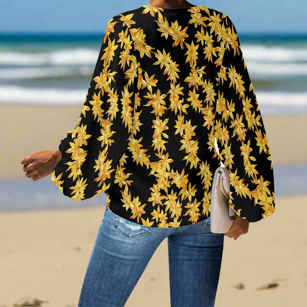 Tropical Black and Gold Lei V-Neck Chiffon Puff Sleeve Blouse by Luxtrini