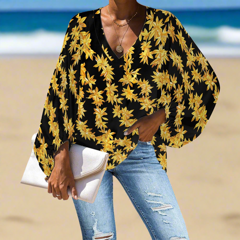Tropical Black and Gold Lei V-Neck Chiffon Puff Sleeve Blouse by Luxtrini