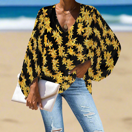 Tropical Black and Gold Lei V-Neck Chiffon Puff Sleeve Blouse by Luxtrini