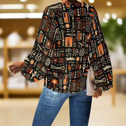 African Ethnic Glyphs V-Neck Chiffon Puff Sleeve Blouse by Luxtrini