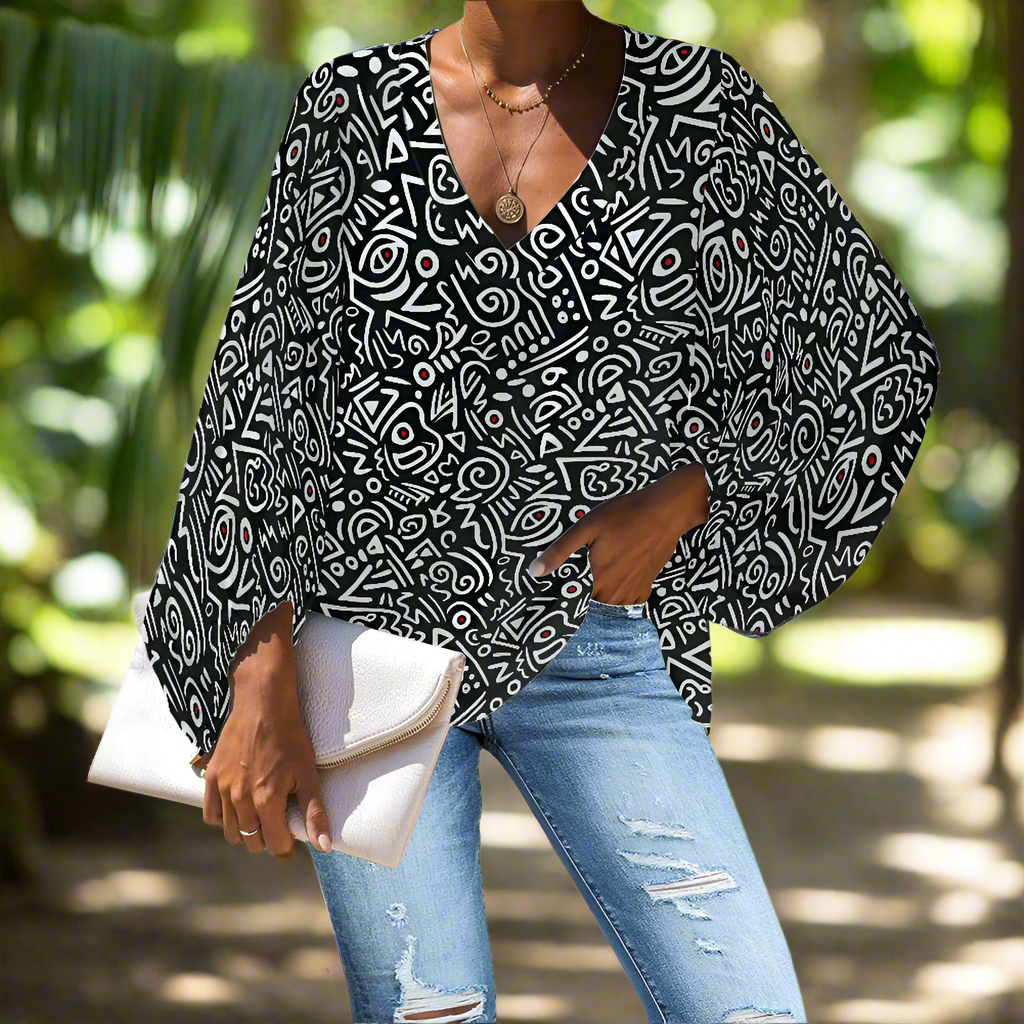 Black and White Tribal Art Pattern V-Neck Chiffon Puff Sleeve Blouse by Luxtrini